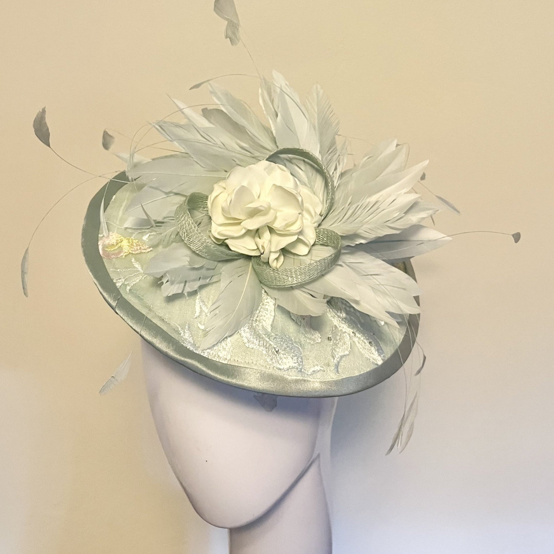 Seafoam Disc with feathers