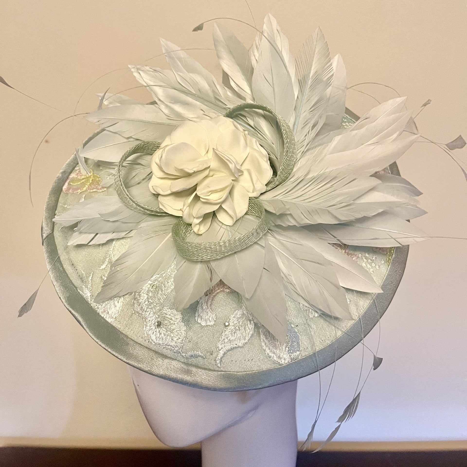 Seafoam Disc with feathers